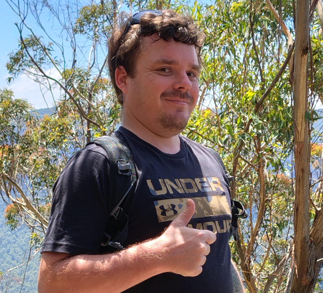 Shane Currie outdoors in the bush